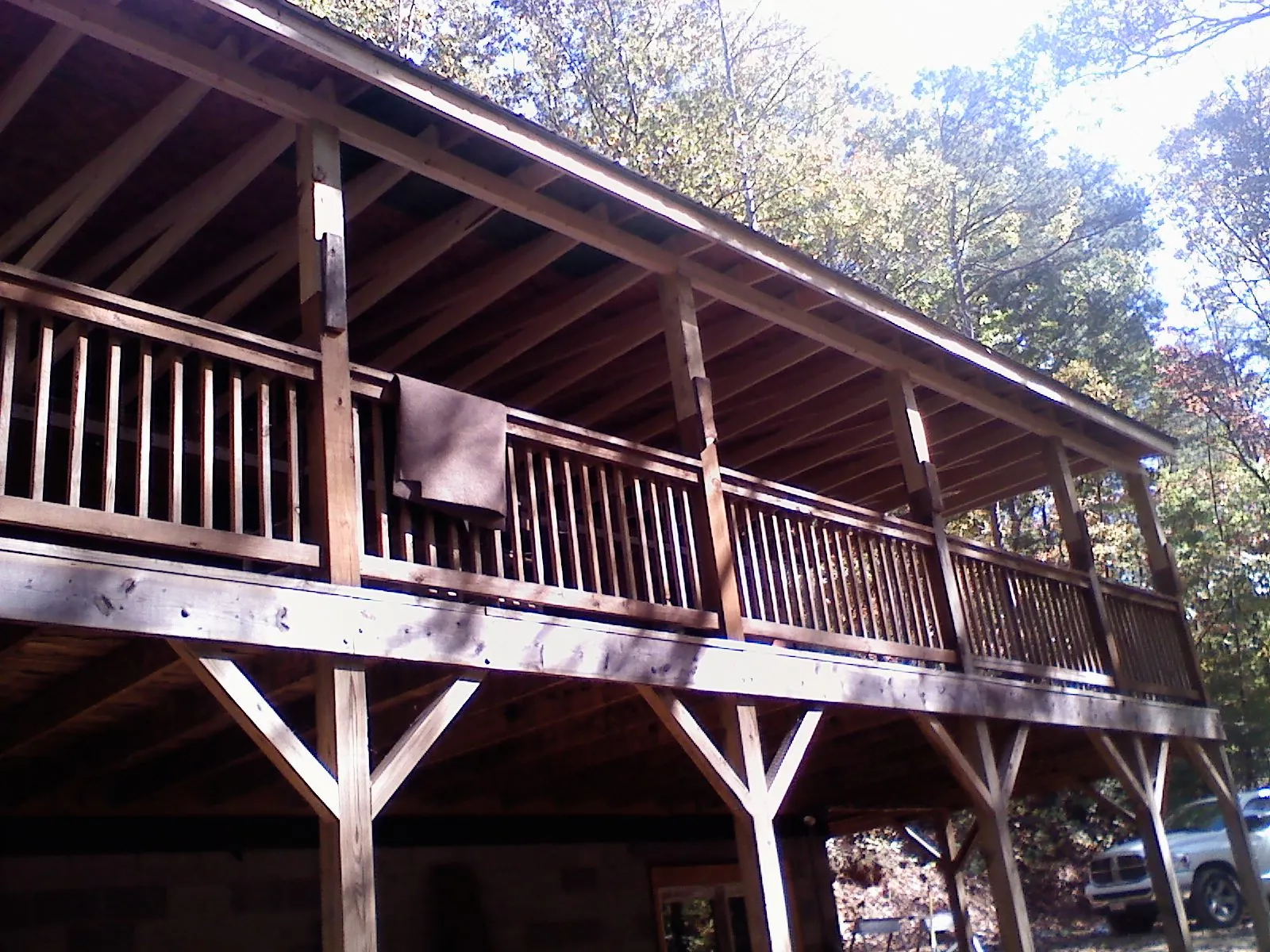 Timber framing under a new elevated porch and deck — Roof Leak Repair in Minerva by Roofing Brothers